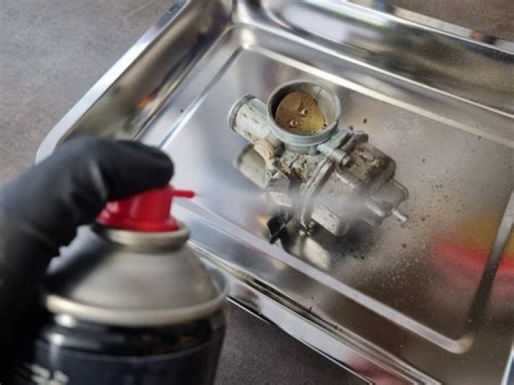 What do you use to clean a carburetor with gas?